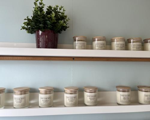 Scented candles on a shelf
