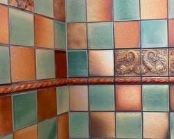 photo of handmade ceramic tiles installed in a bathroom.